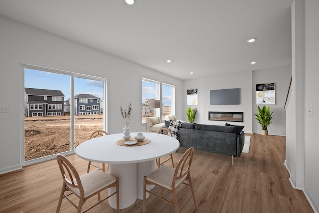 7130 Large Ave NE, Otsego, MN 55301 - dining space featuring light wood-style flooring, recessed lighting, and baseboards