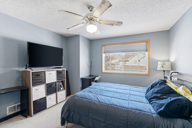 20616 Erin Way Unit 74, Farmington, MN 55024 - bedroom with carpet flooring, ceiling fan, and a textured ceiling