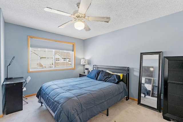 20616 Erin Way Unit 74, Farmington, MN 55024 - carpeted bedroom featuring baseboards, a textured ceiling, and a ceiling fan