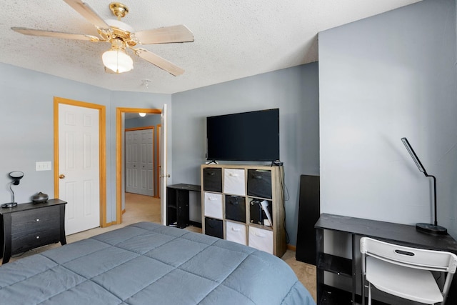 20616 Erin Way Unit 74, Farmington, MN 55024 - bedroom with a textured ceiling, a ceiling fan, and carpet