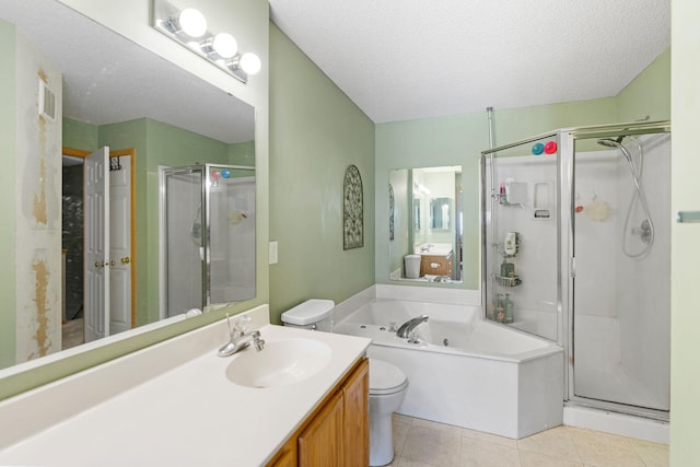 20616 Erin Way Unit 74, Farmington, MN 55024 - bathroom with a shower stall, a jetted tub, toilet, vanity, and tile patterned flooring