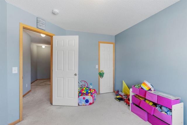 20616 Erin Way Unit 74, Farmington, MN 55024 - game room with carpet flooring and a textured ceiling