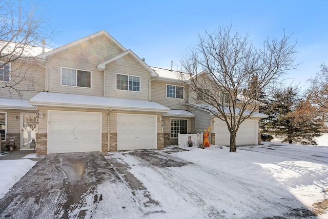 20616 Erin Way Unit 74, Farmington, MN 55024 - view of front of house featuring a garage and brick siding