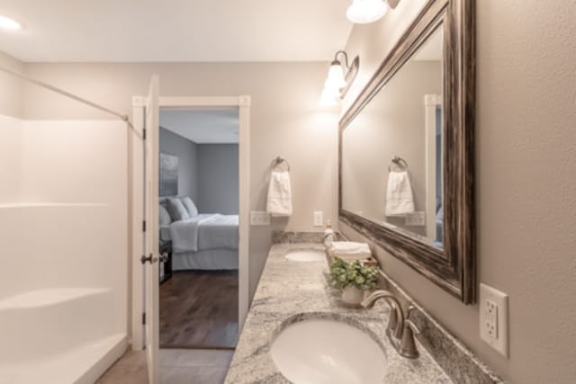642 Haeberle Ave, New Ulm, MN 56073 - ensuite bathroom featuring double vanity and a shower
