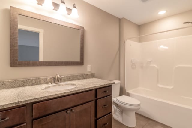 642 Haeberle Ave, New Ulm, MN 56073 - full bathroom with vanity, tile patterned flooring, shower / washtub combination, and recessed lighting