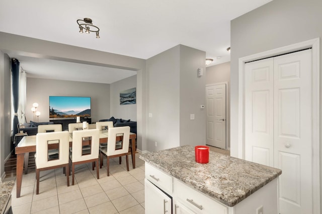 12049 Waconia Cir NE, Blaine, MN 55449 - dining area with light tile patterned floors and baseboards