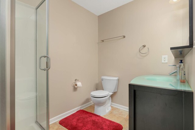 12049 Waconia Cir NE, Blaine, MN 55449 - bathroom featuring a shower stall, vanity, toilet, and baseboards