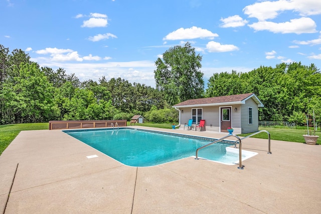 11520 120th St N, Stillwater, MN 55082 - swimming pool featuring an outbuilding, a patio, and a storage structure
