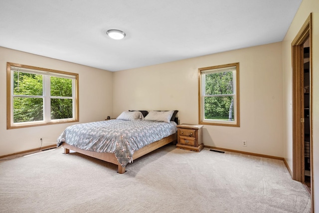11520 120th St N, Stillwater, MN 55082 - bedroom featuring light carpet and baseboards
