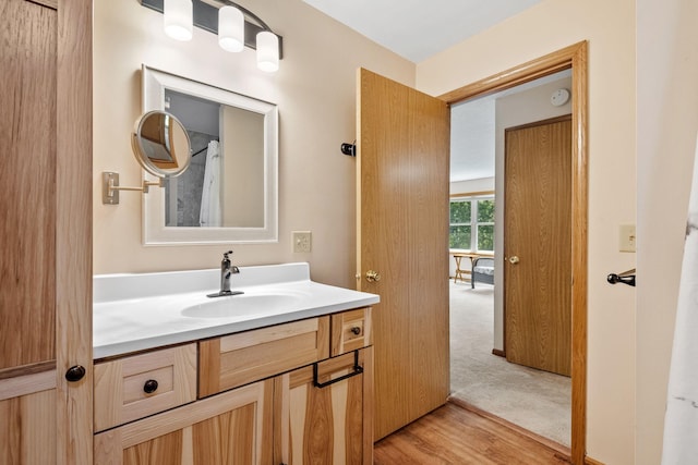 11520 120th St N, Stillwater, MN 55082 - bathroom featuring vanity and wood finished floors