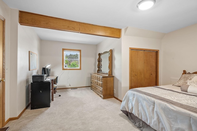 11520 120th St N, Stillwater, MN 55082 - bedroom with light carpet, baseboards, an office area, and a closet
