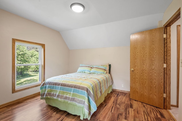 11520 120th St N, Stillwater, MN 55082 - bedroom featuring lofted ceiling, baseboards, and wood finished floors