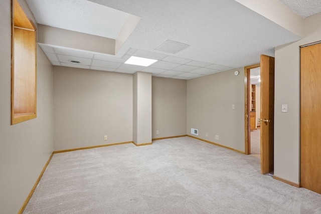 11520 120th St N, Stillwater, MN 55082 - finished basement featuring carpet, a paneled ceiling, and baseboards