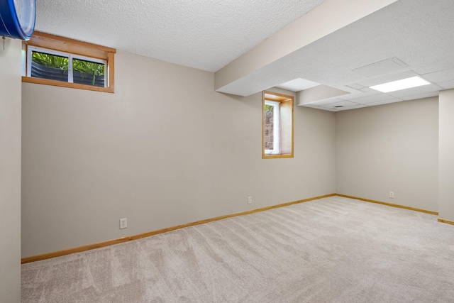 11520 120th St N, Stillwater, MN 55082 - below grade area featuring carpet flooring, baseboards, and a textured ceiling