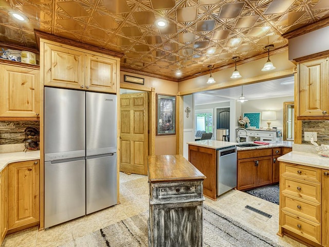 1144 Waldon Pl, Arden Hills, MN 55112 - kitchen featuring appliances with stainless steel finishes, ornamental molding, an ornate ceiling, a sink, and light countertops