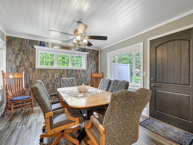 1144 Waldon Pl, Arden Hills, MN 55112 - dining space featuring wood finished floors, a ceiling fan, and crown molding