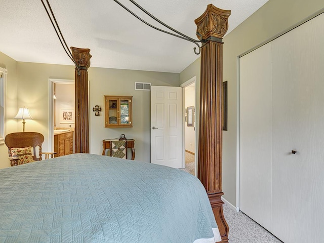 1144 Waldon Pl, Arden Hills, MN 55112 - carpeted bedroom featuring a closet, ornate columns, and baseboards