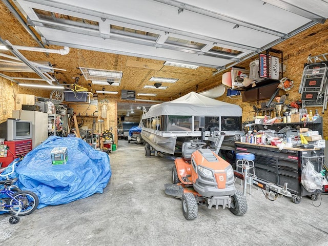 1144 Waldon Pl, Arden Hills, MN 55112 - garage featuring a workshop area