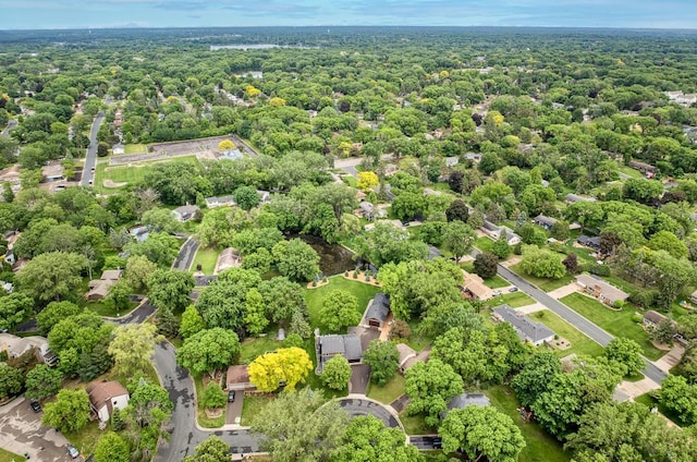 1144 Waldon Pl, Arden Hills, MN 55112 - aerial view of residential area featuring a heavily wooded area
