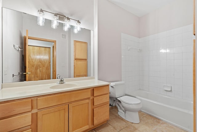 560 2nd St Unit 408, Minneapolis, MN 55401 - bathroom with toilet, vanity, tile patterned floors, and washtub / shower combination