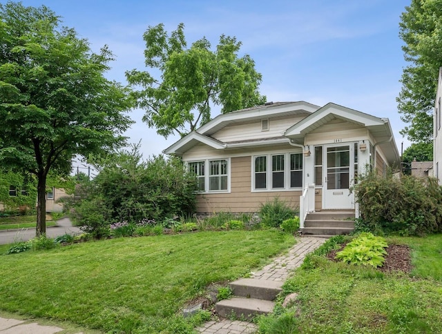 1441 Simpson St, Saint Paul, MN 55108 - bungalow featuring a front yard