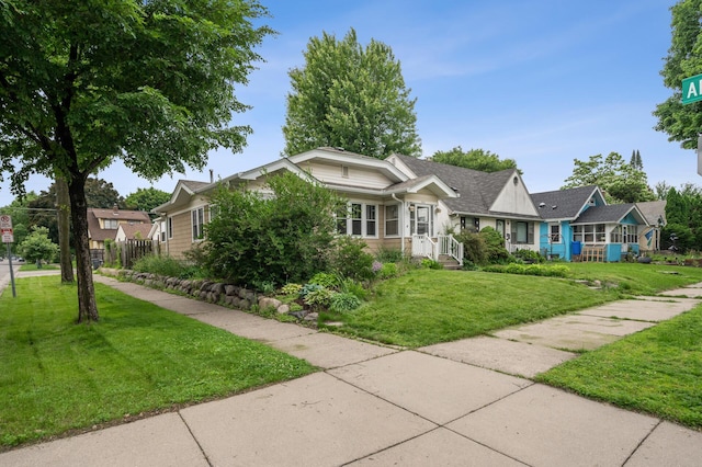 1441 Simpson St, Saint Paul, MN 55108 - view of front of property featuring a front lawn