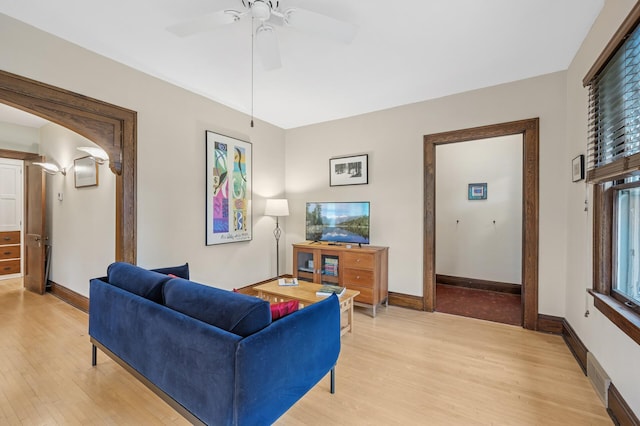 1441 Simpson St, Saint Paul, MN 55108 - living room with light wood finished floors and a ceiling fan