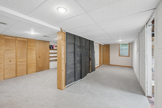 1441 Simpson St, Saint Paul, MN 55108 - below grade area featuring carpet, a drop ceiling, and stairs
