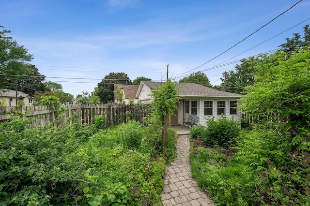 1441 Simpson St, Saint Paul, MN 55108 - view of yard with an outbuilding