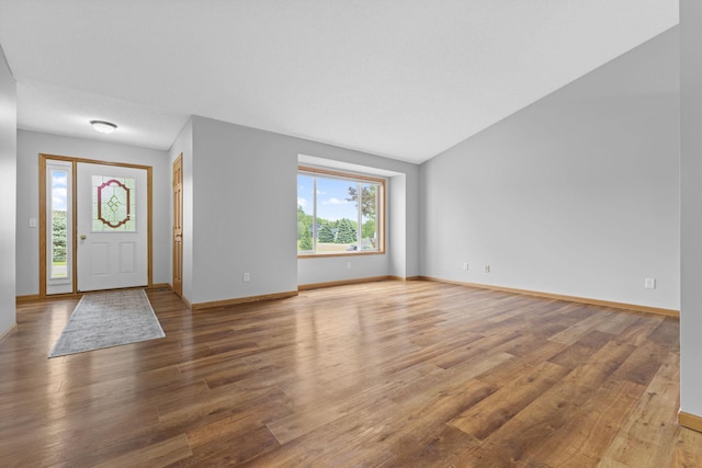 18358 Jenkins St NE, East Bethel, MN 55011 - foyer with baseboards and wood finished floors