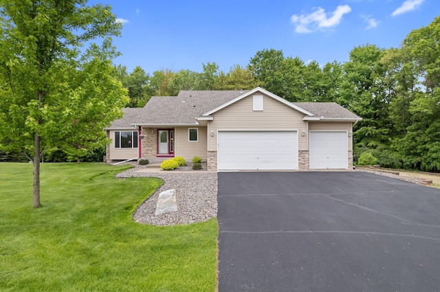 18358 Jenkins St NE, East Bethel, MN 55011 - ranch-style house with an attached garage, driveway, a front yard, and roof with shingles