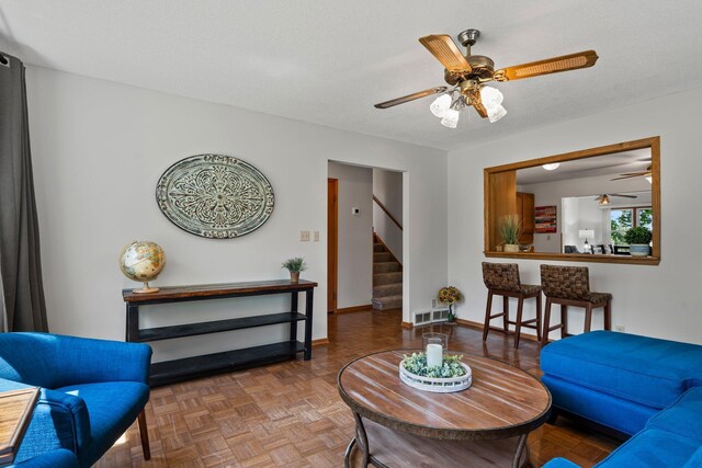 8170 113th St S, Cottage Grove, MN 55016 - living area with stairway, ceiling fan, and baseboards