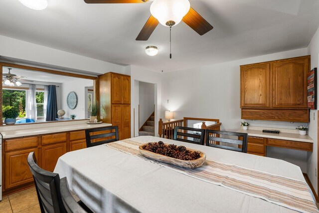 8170 113th St S, Cottage Grove, MN 55016 - dining area featuring a ceiling fan and light tile patterned floors