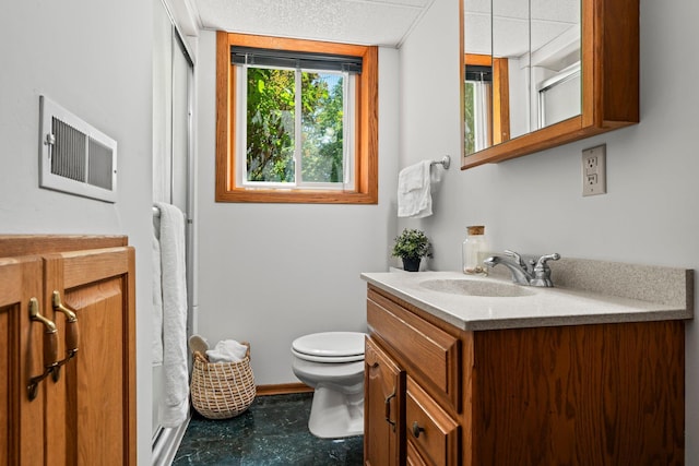 8170 113th St S, Cottage Grove, MN 55016 - full bath with vanity, a shower with shower curtain, toilet, and tile patterned floors