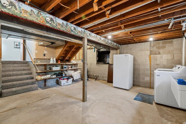 8170 113th St S, Cottage Grove, MN 55016 - unfinished basement with freestanding refrigerator, washing machine and dryer, and stairs