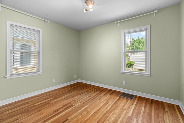 5749 Pleasant Ave S, Minneapolis, MN 55419 - spare room featuring baseboards and light wood-style flooring
