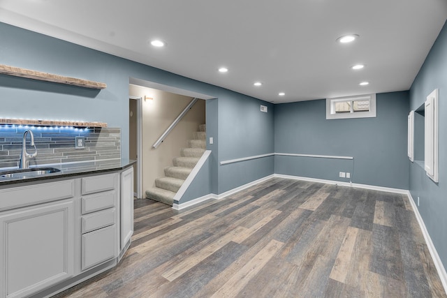 5749 Pleasant Ave S, Minneapolis, MN 55419 - below grade area with a sink, dark wood-style floors, recessed lighting, baseboards, and stairway