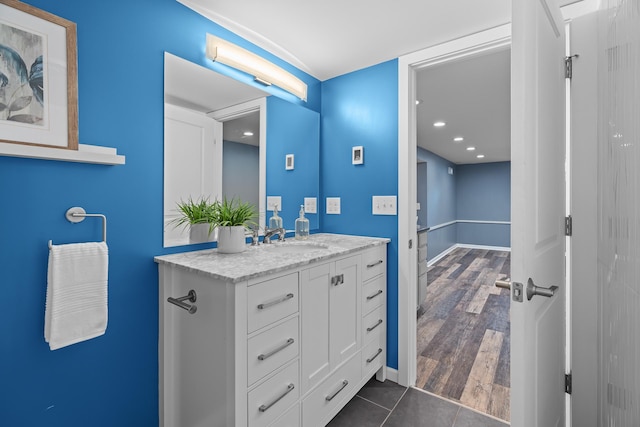 5749 Pleasant Ave S, Minneapolis, MN 55419 - bathroom with vanity, baseboards, and tile patterned flooring