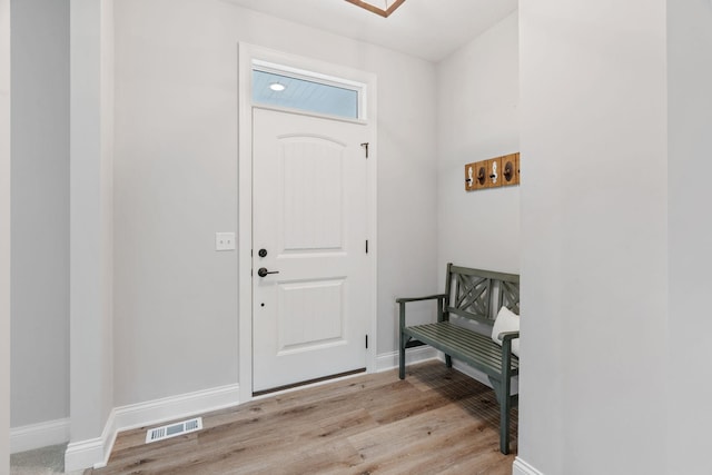 7137 61st St S, Cottage Grove, MN 55016 - entryway with light wood-type flooring and baseboards