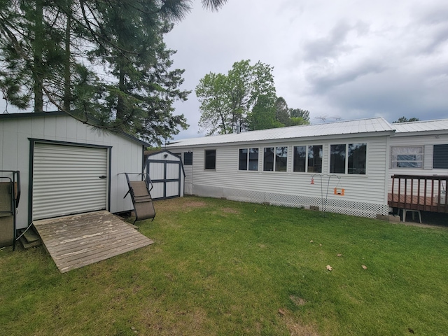 32360 215th Ln Lot A1, Isle, MN 56342 - rear view of house with a lawn, a wooden deck, and metal roof