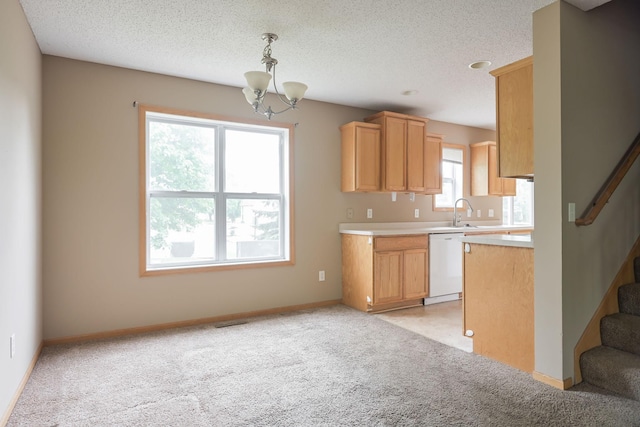 3003 Cutters Grove Ave, Anoka, MN 55303 - kitchen featuring dishwasher, a chandelier, light countertops, light carpet, and a textured ceiling