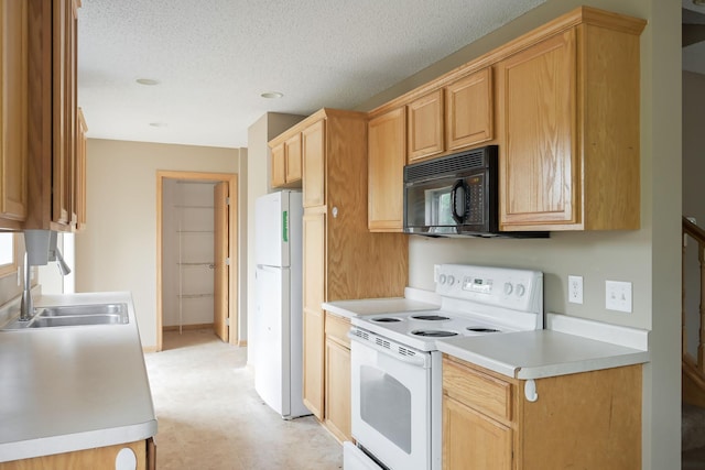 3003 Cutters Grove Ave, Anoka, MN 55303 - kitchen featuring white appliances, a sink, light countertops, light brown cabinets, and a textured ceiling