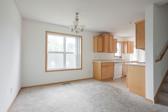 3007 Cutters Grove Ave, Anoka, MN 55303 - kitchen featuring dishwasher, a chandelier, light carpet, light countertops, and a textured ceiling