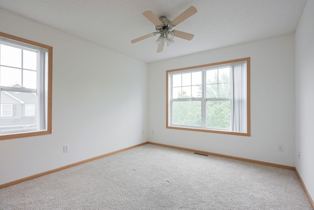 3007 Cutters Grove Ave, Anoka, MN 55303 - spare room with carpet flooring, baseboards, and a ceiling fan