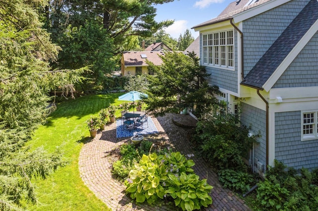 14 Forest Dale Rd, Minneapolis, MN 55410 - view of grassy yard featuring outdoor dining space