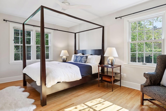14 Forest Dale Rd, Minneapolis, MN 55410 - bedroom featuring multiple windows and wood finished floors