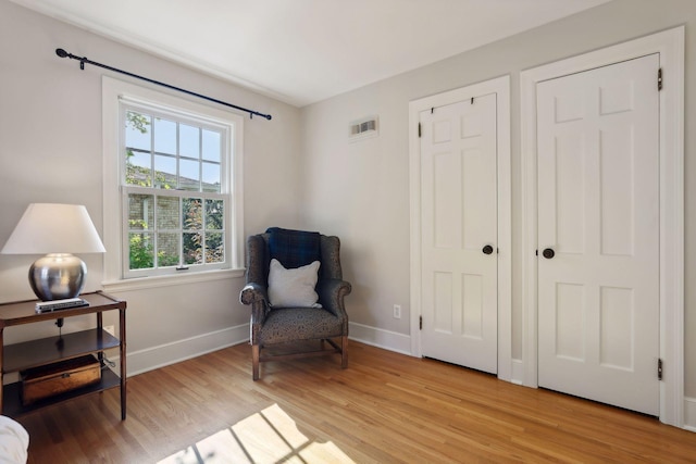 14 Forest Dale Rd, Minneapolis, MN 55410 - sitting room with plenty of natural light, light wood-style floors, and baseboards