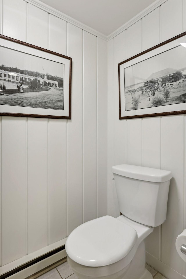 14 Forest Dale Rd, Minneapolis, MN 55410 - bathroom featuring baseboard heating, a decorative wall, toilet, and tile patterned floors