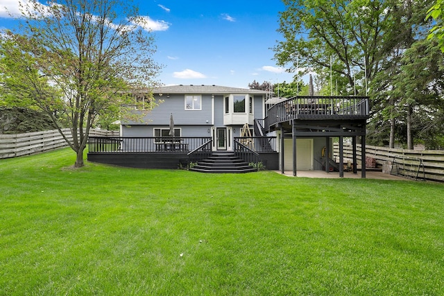 843 Northdale Blvd NW, Coon Rapids, MN 55448 - back of property with stairs, a deck, and a patio