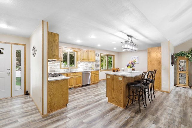 843 Northdale Blvd NW, Coon Rapids, MN 55448 - kitchen featuring appliances with stainless steel finishes, light countertops, light wood-type flooring, and recessed lighting